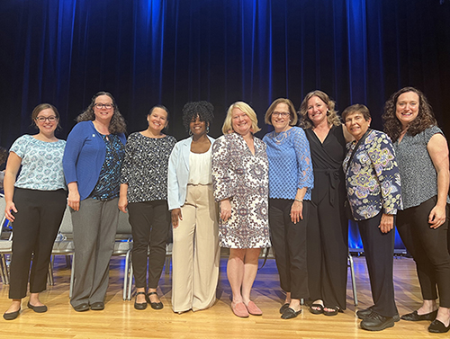 Members of the UNC-Chapel Hill class of 2025 nursing students pose for a photo.