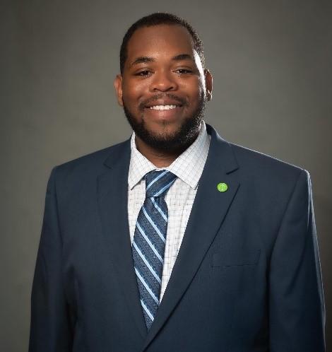 A headshot of John Fuller