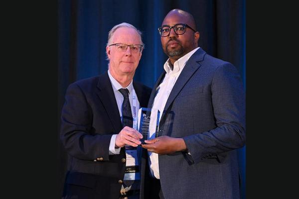 Okeke receiving award