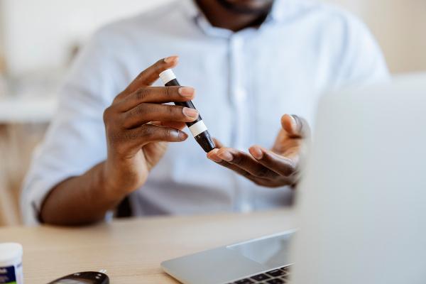 Person checking blood glucose