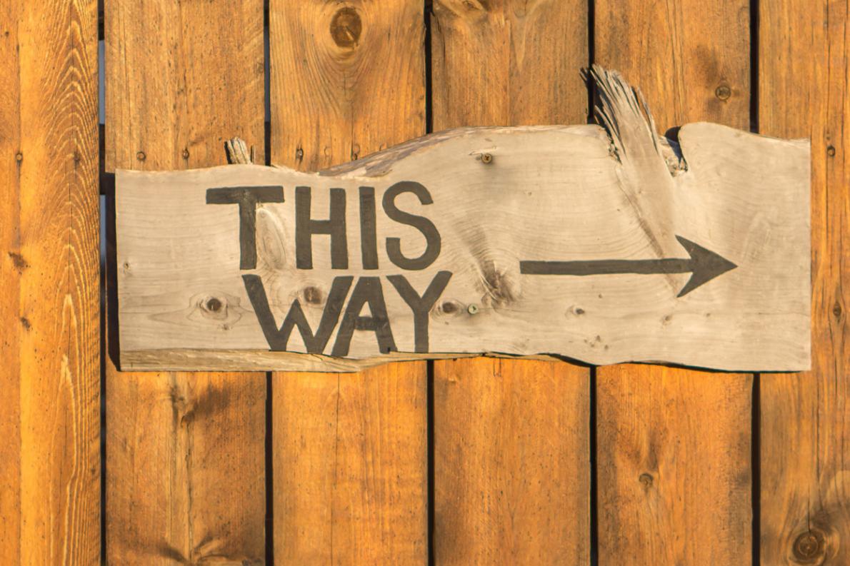 This Way sign
