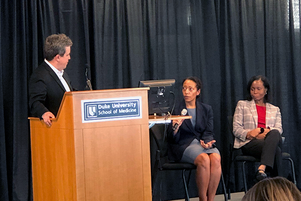 An image of, from left to right, Adrian Hernandez, Lisa McElroy, and Kimberly Johnson at the Dean's Distinguished Research Series