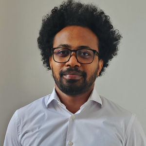 A headshot of Dr. Mesfin Genie 