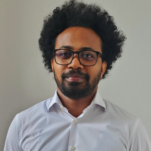 A headshot of Dr. Mesfin Genie