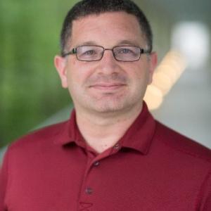A headshot of David Anderson