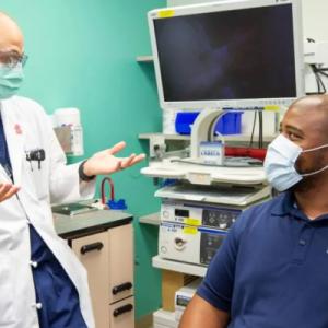 Doctor explaining research to patient