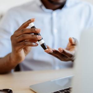 Person checking blood glucose